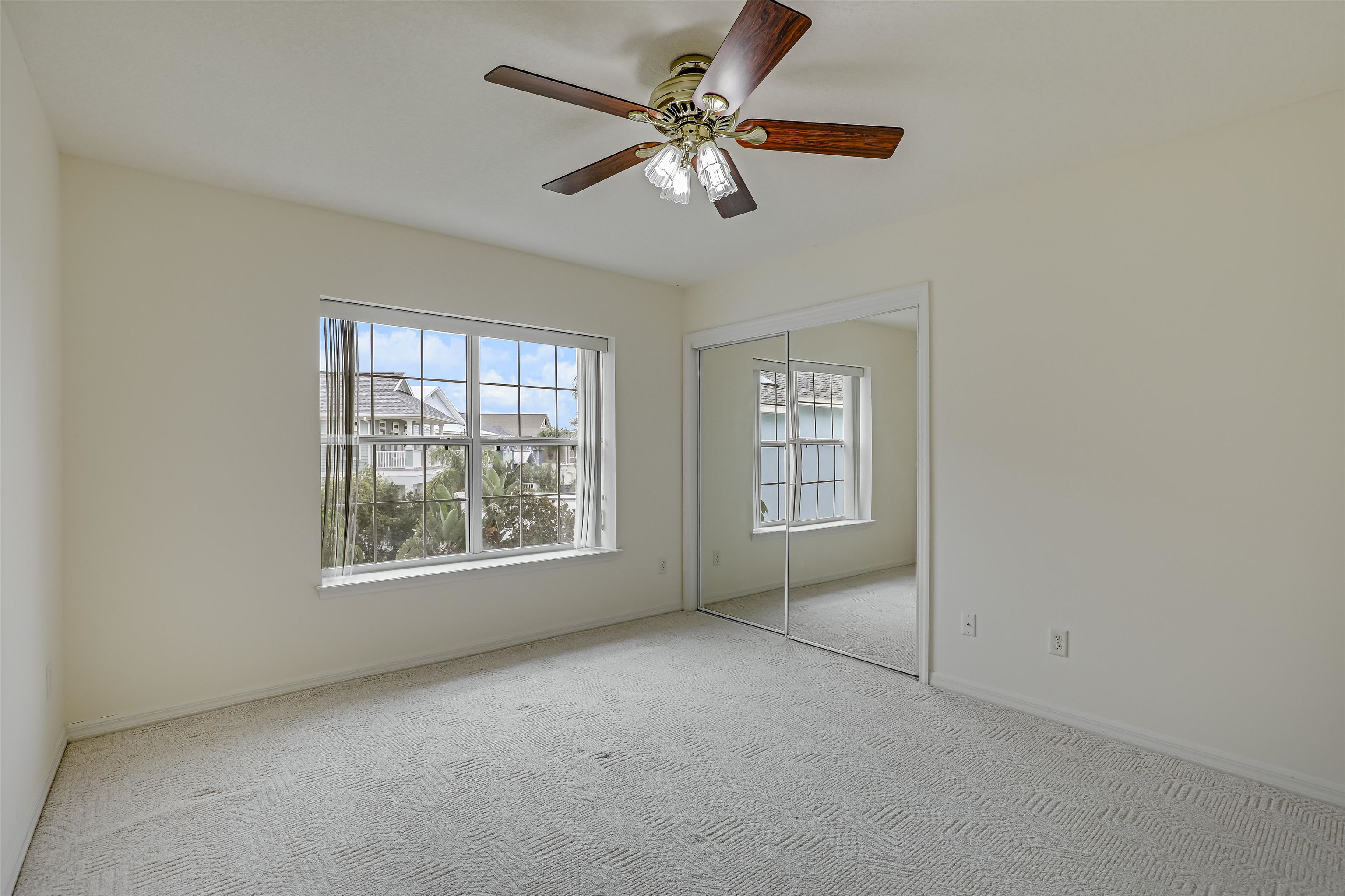 9162 August Circle St. Augustine, FL 32080 - Photo 48 of 81 a view of an empty room with a window