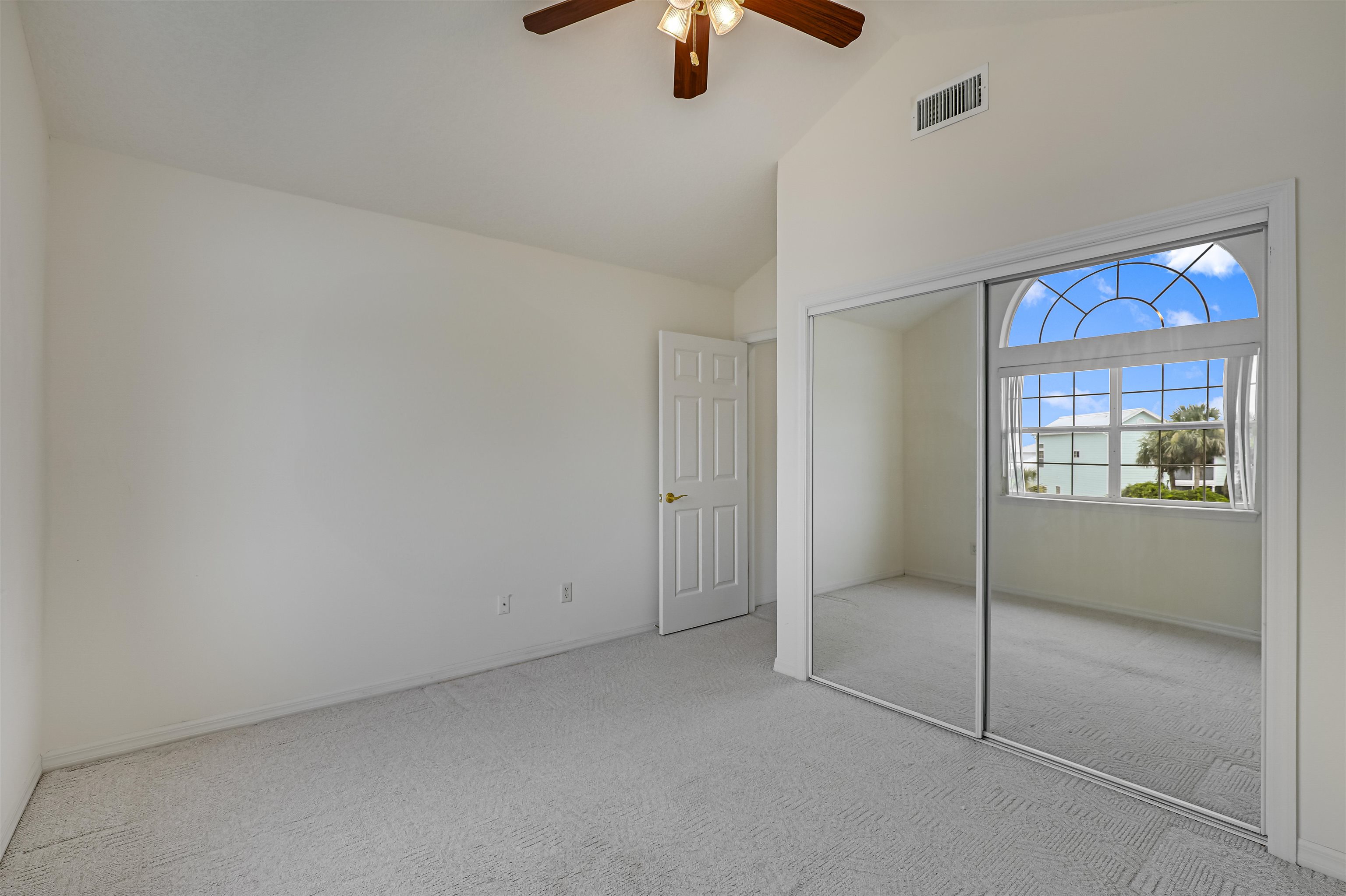 9162 August Circle St. Augustine, FL 32080 - Photo 50 of 81 a view of an empty room with a window