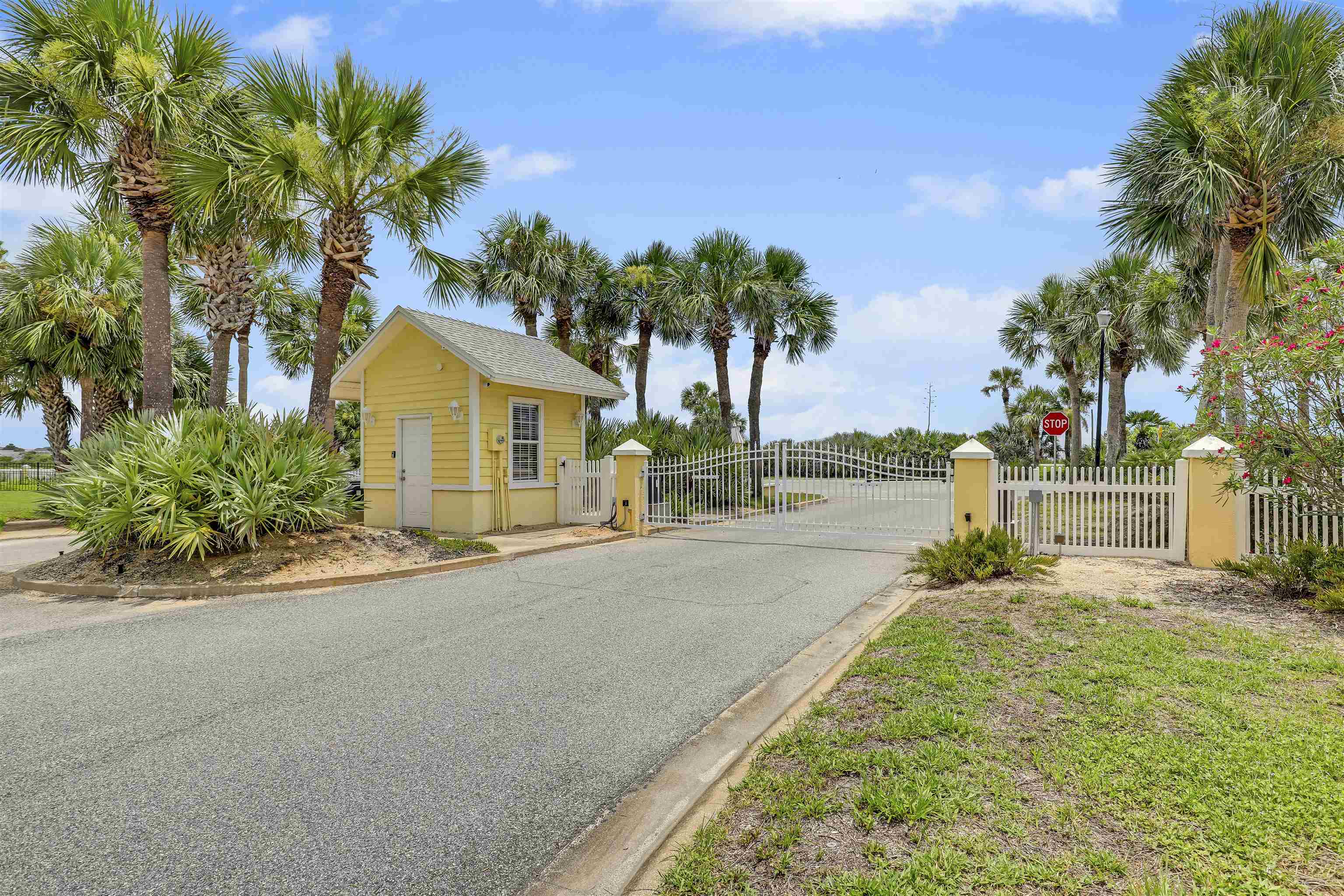 9162 August Circle St. Augustine, FL 32080 - Photo 56 of 81 a front view of a house with a yard and garage