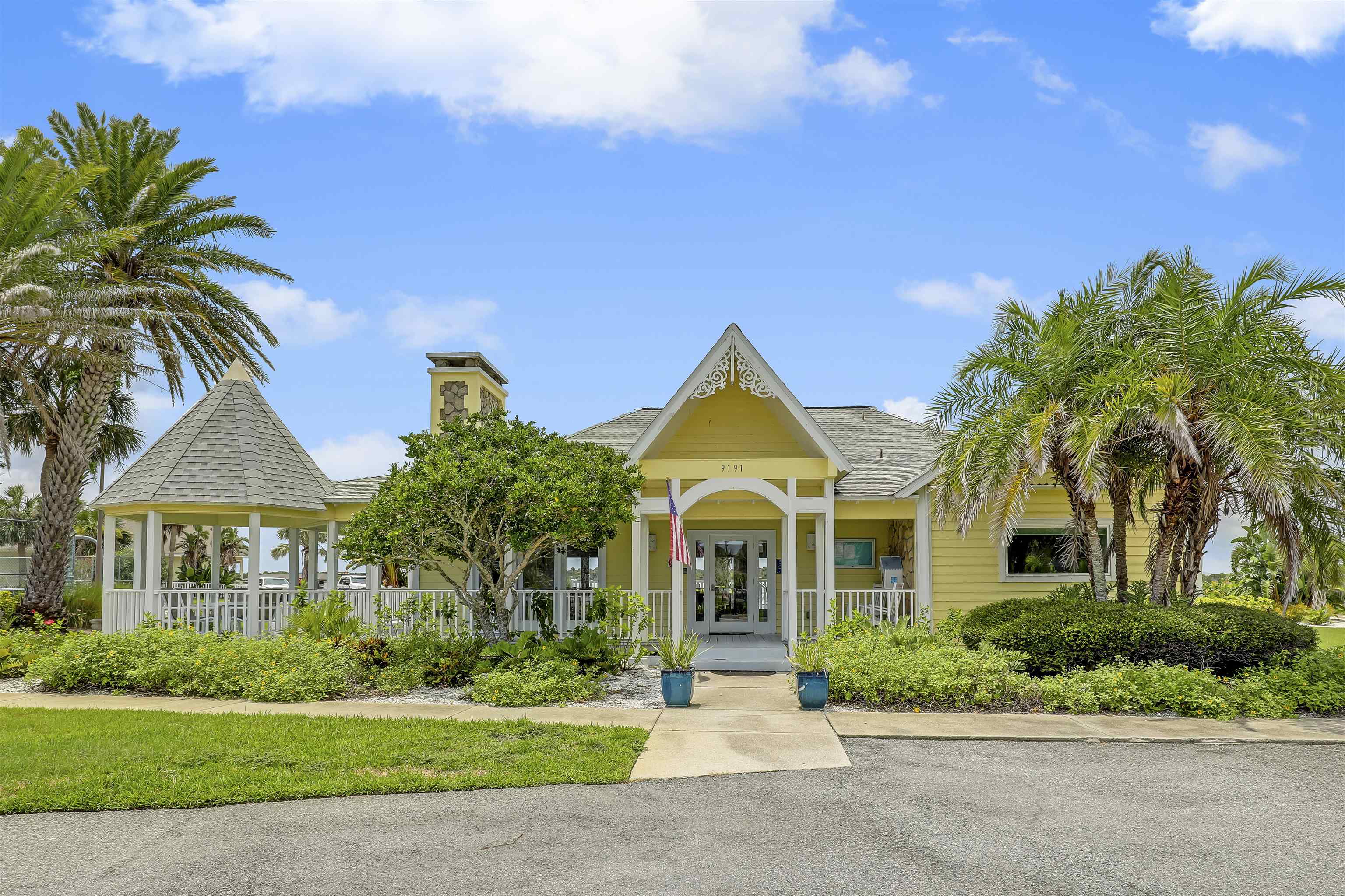 9162 August Circle St. Augustine, FL 32080 - Photo 58 of 81 a front view of a house with a yard