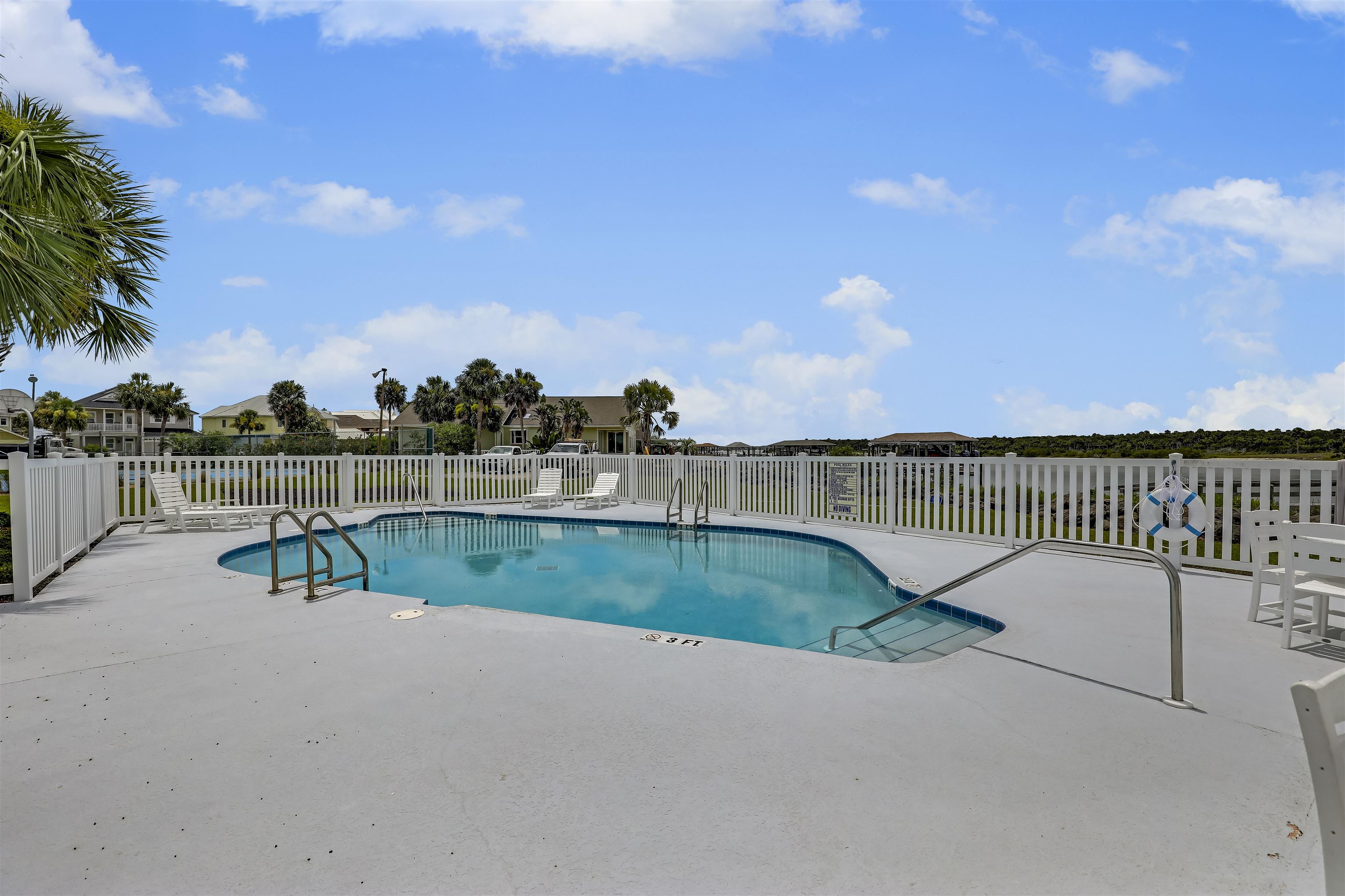 9162 August Circle St. Augustine, FL 32080 - Photo 59 of 81 a view of a swimming pool with a terrace