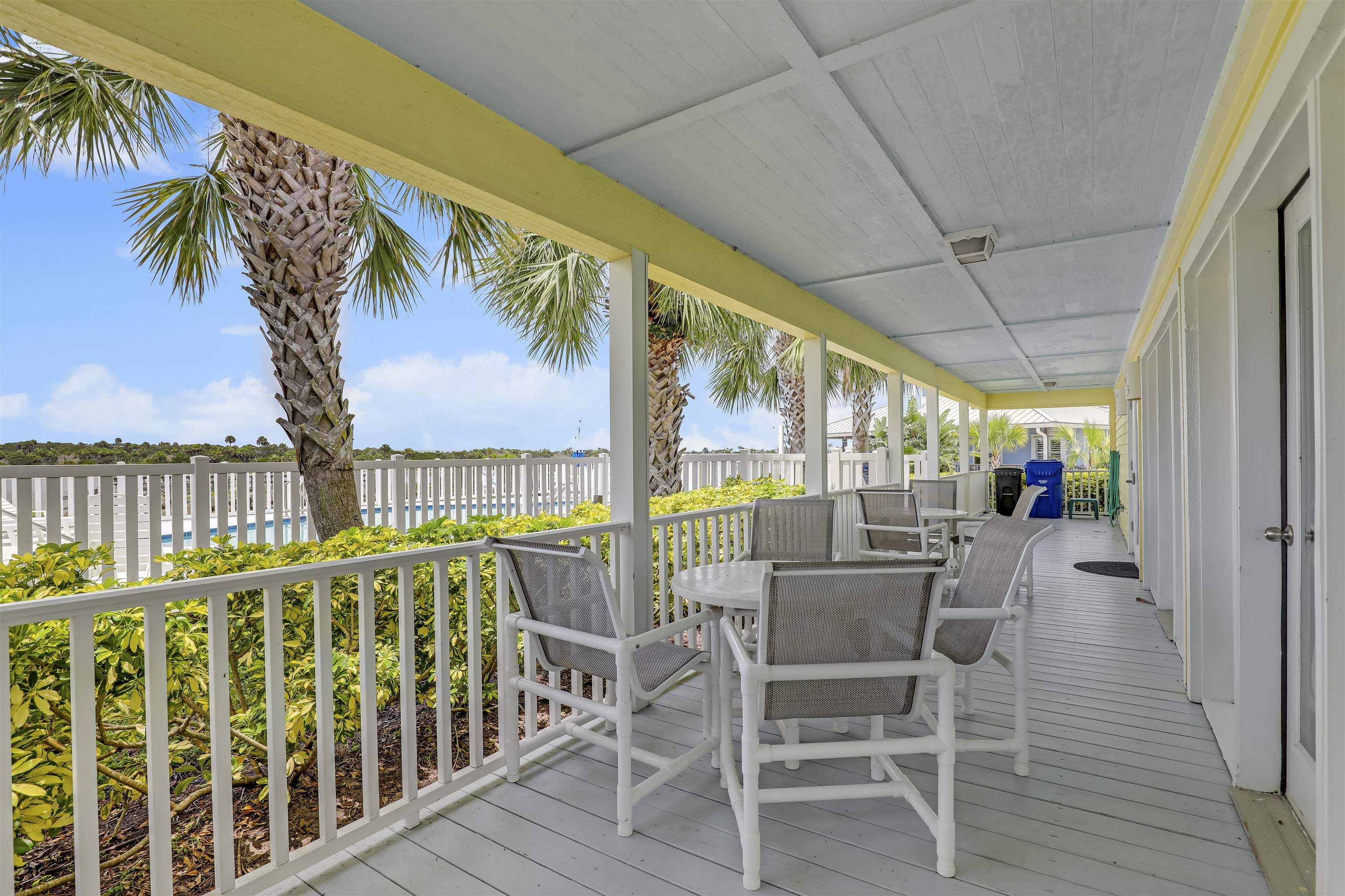 9162 August Circle St. Augustine, FL 32080 - Photo 65 of 81 a view of a chairs and table in patio with wooden floor