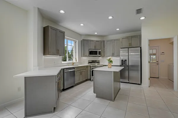 a view of a door and a window