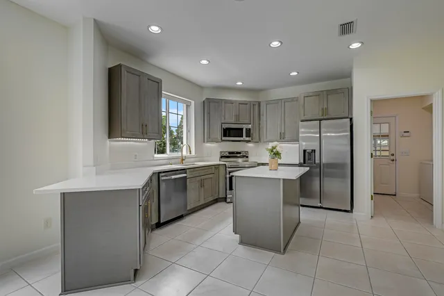 a view of a door and a window