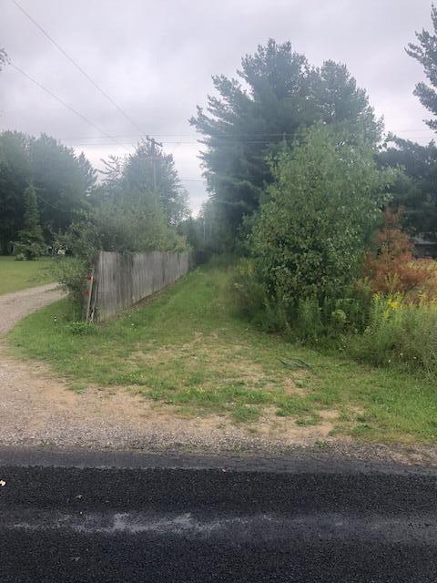 5000 South East County Line Road Shepherd, MI 48883 - Photo 10 of 11 Easement- N side of fence.