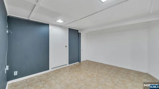 a two chairs sitting in front of a house