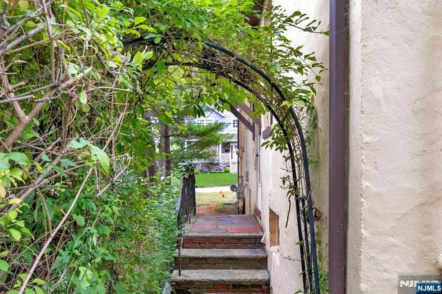 a pathway with a yard