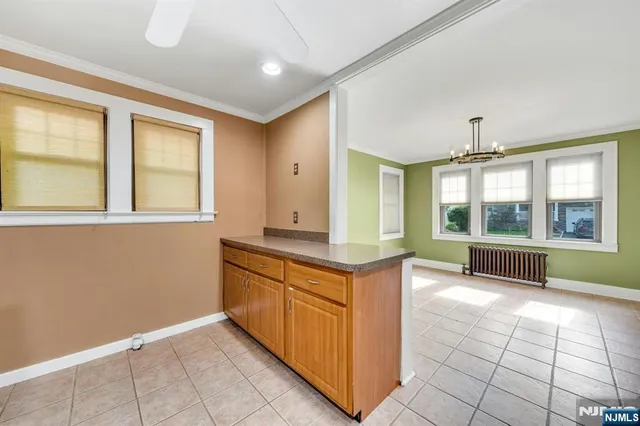 a spacious bathroom with a sink a mirror and a bathtub
