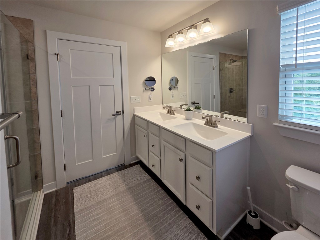 224 Bronson Ridge Anderson, SC 29621 - Photo 18 of 42 Double vanity in a primary bathroom provides ample space and sleek modern fixtures.