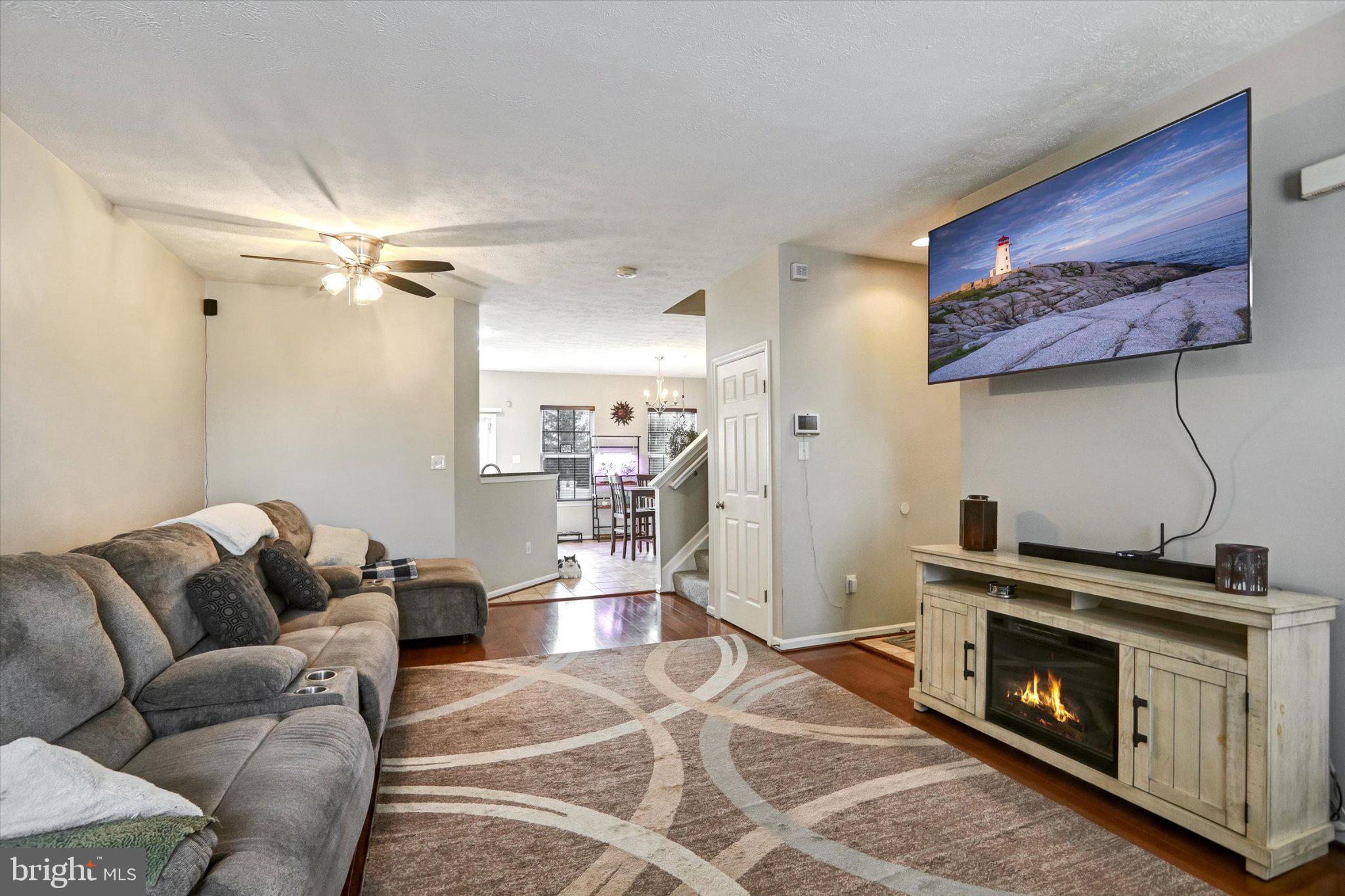 9663 Davison Road Middle River, MD 21220 - Photo 2 of 45 a living room with furniture and a fireplace