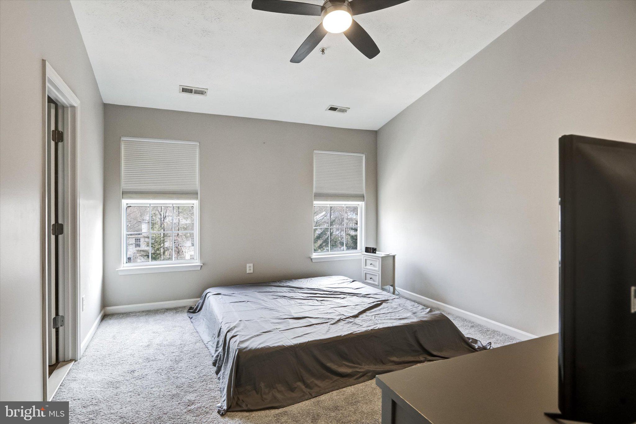 9663 Davison Road Middle River, MD 21220 - Photo 21 of 45 a bedroom with a bed and a window