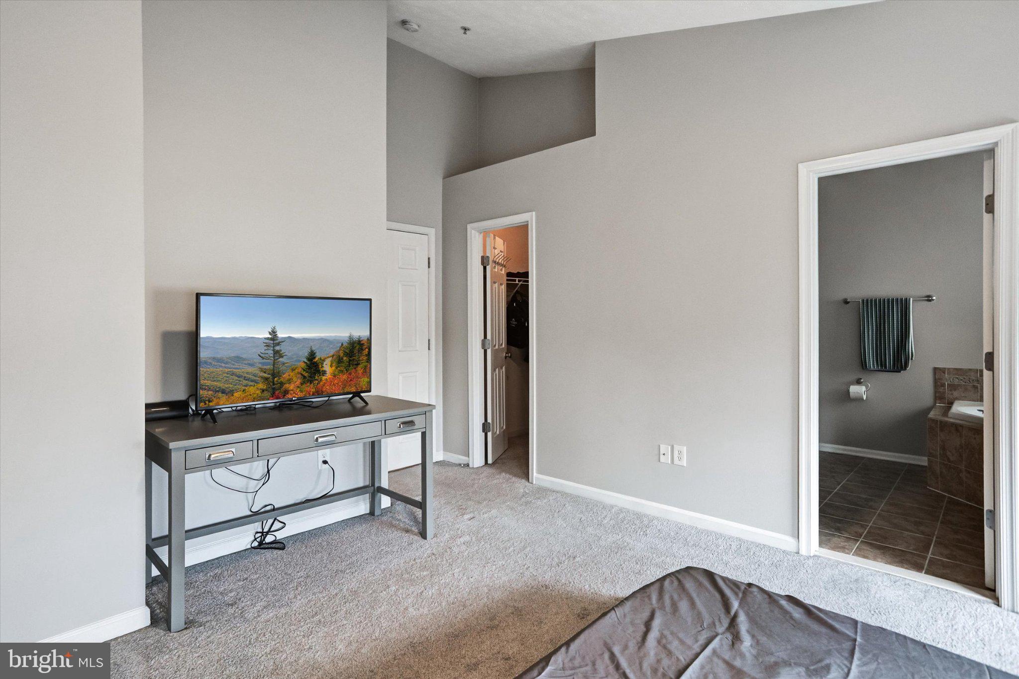 9663 Davison Road Middle River, MD 21220 - Photo 23 of 45 a living room with furniture and a flat screen tv