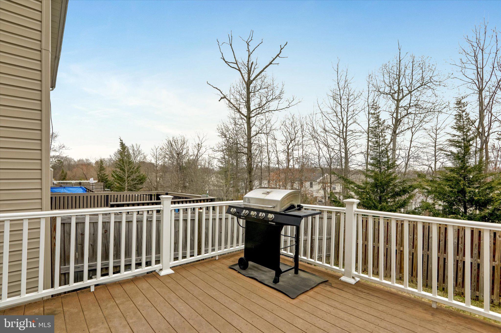 9663 Davison Road Middle River, MD 21220 - Photo 43 of 45 a view of deck with wooden floor and outdoor seating