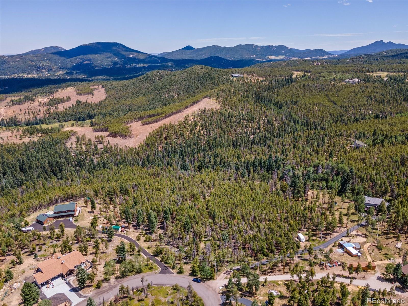 8570 South Warhawk Road Conifer, CO 80433 - Photo 11 of 19 a view of city and mountain