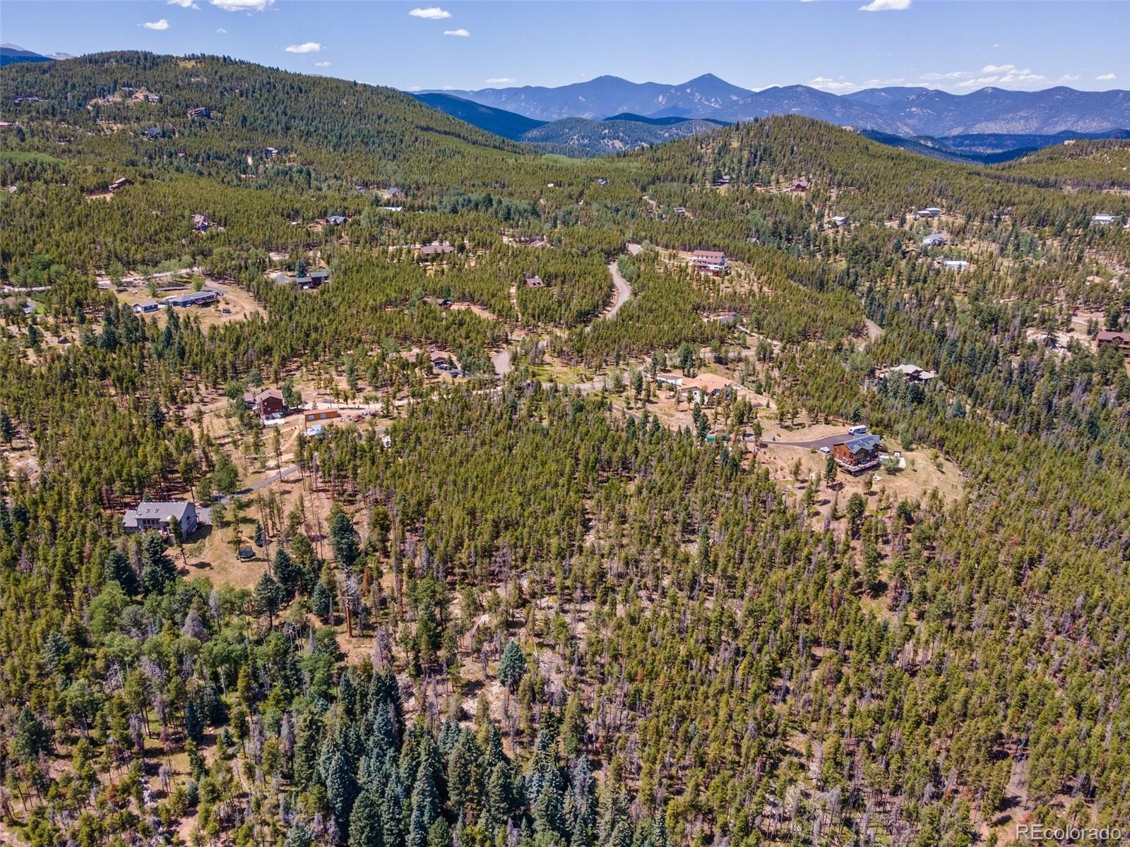 8570 South Warhawk Road Conifer, CO 80433 - Photo 13 of 19 a view of city and mountain
