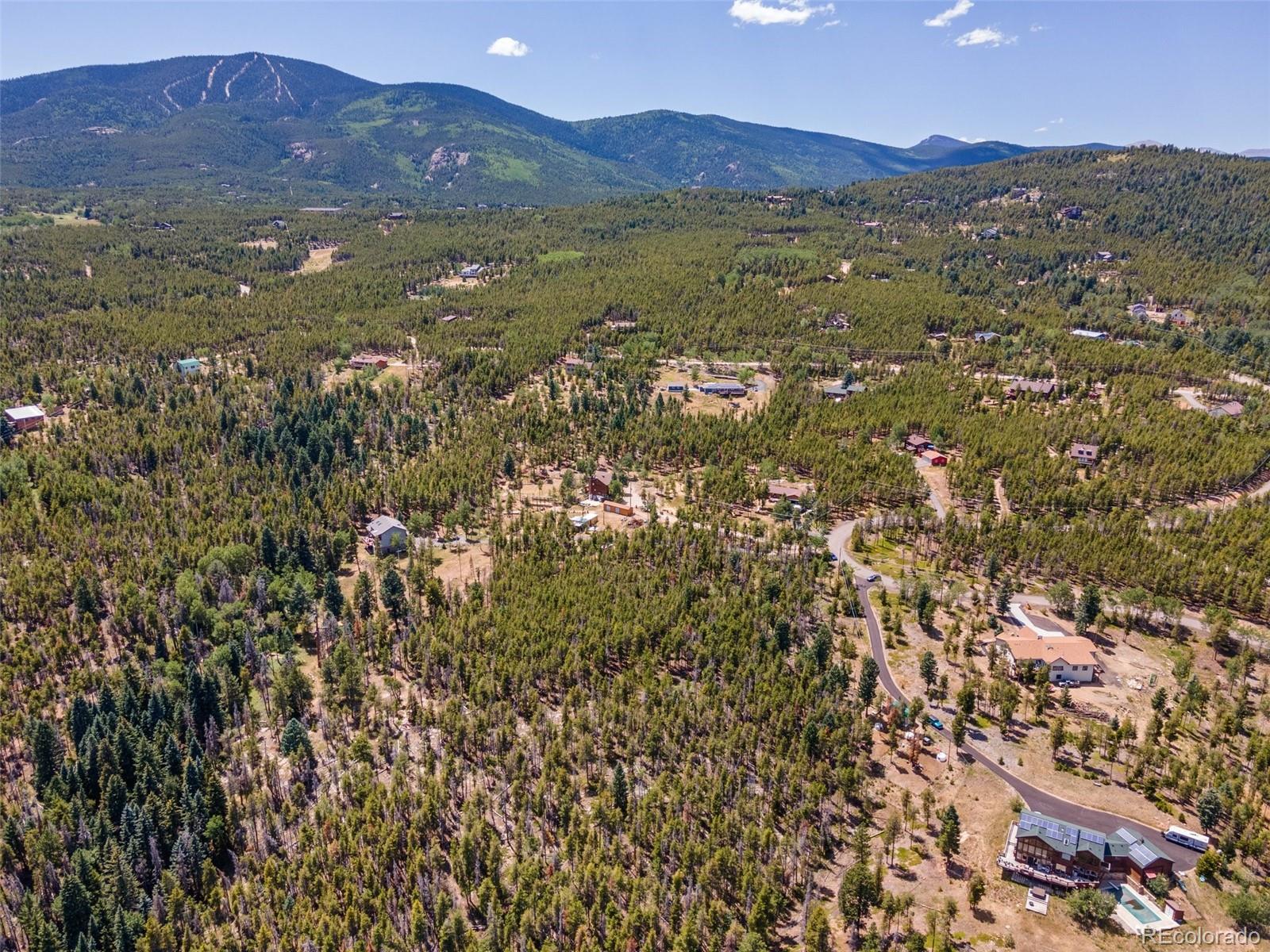 8570 South Warhawk Road Conifer, CO 80433 - Photo 14 of 19 a view of an mountain and an lake view