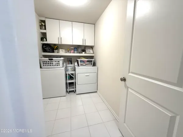 a kitchen with a stove a sink and a refrigerator