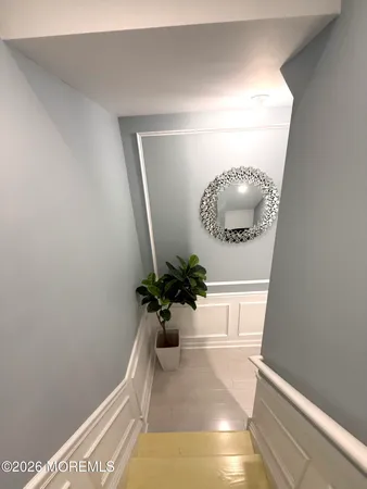 a potted plant sitting on a shelf with a potted plant