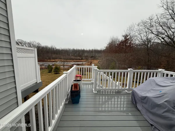a view of balcony with furniture