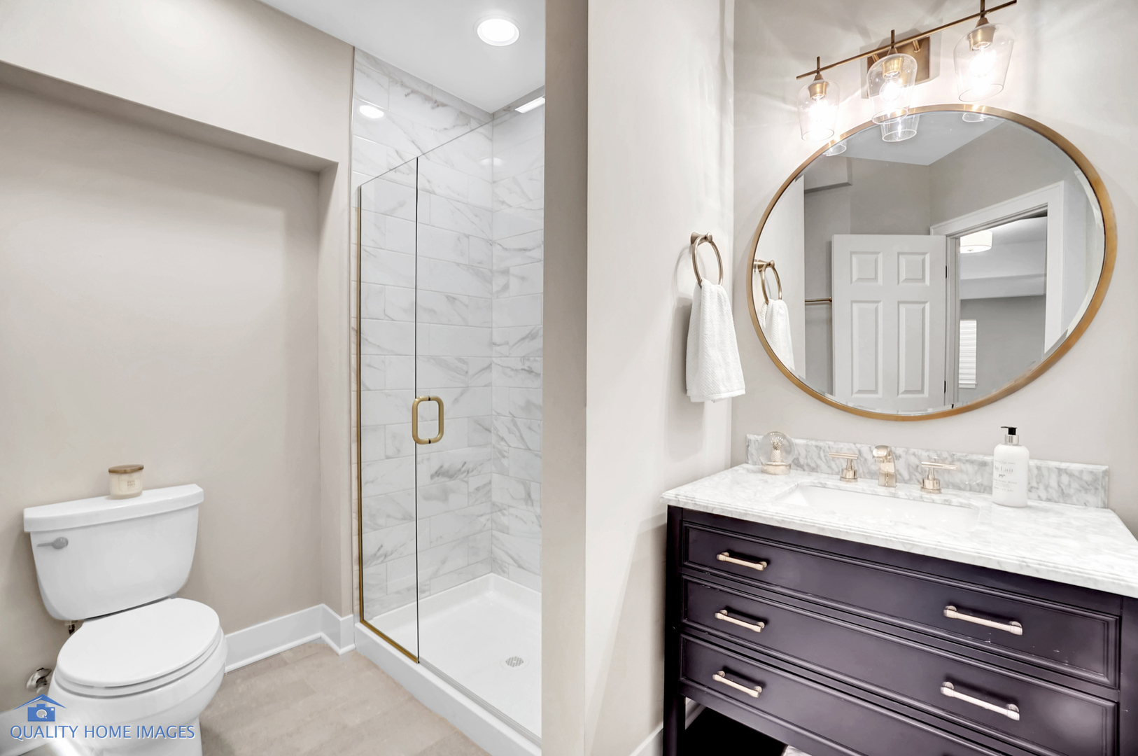 215 North Summit Street Wheaton, IL 60187 - Photo 12 of 36 a bathroom with a sink a toilet and a mirror