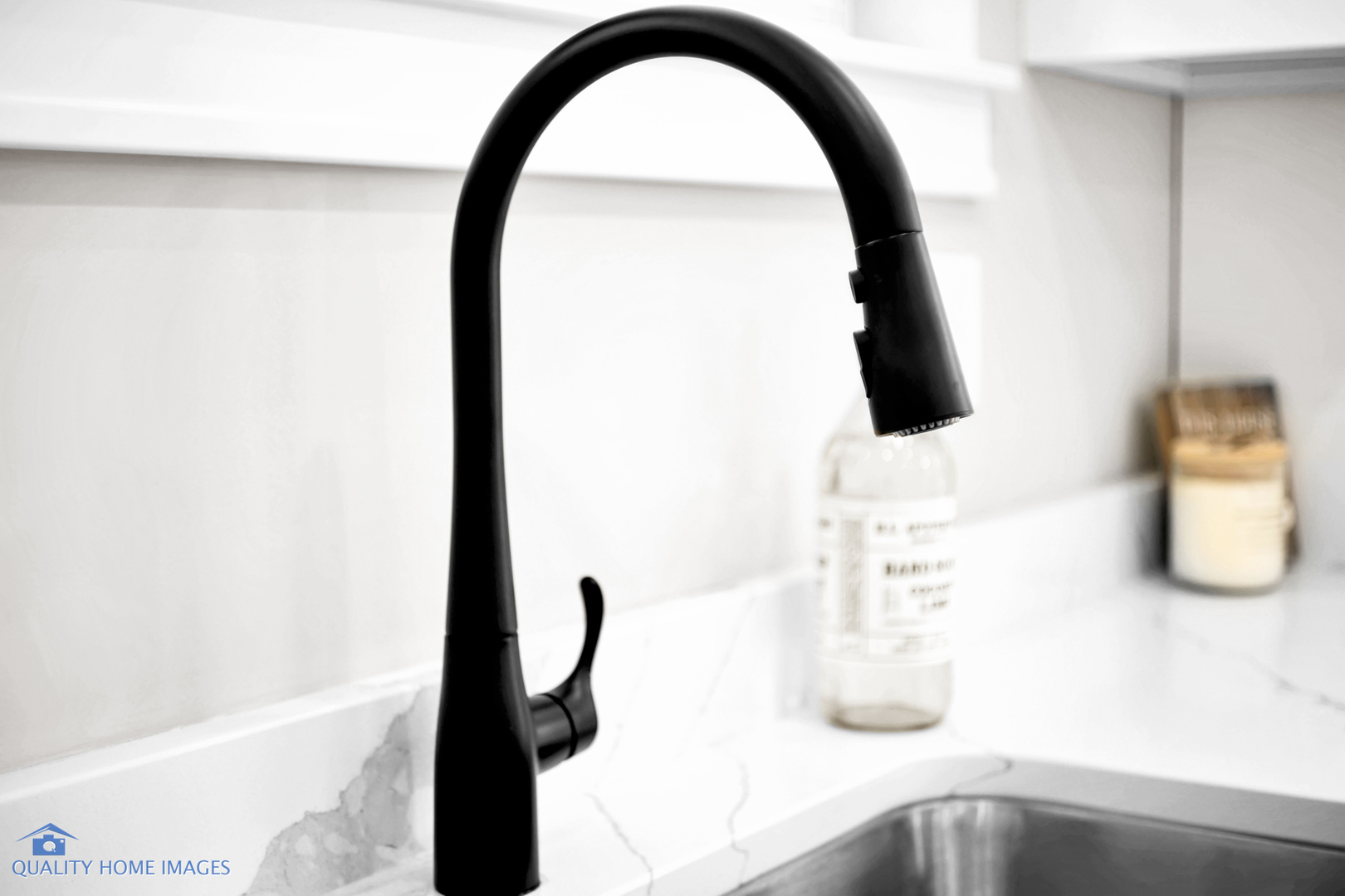 215 North Summit Street Wheaton, IL 60187 - Photo 27 of 36 a bathroom with a sink and a mirror