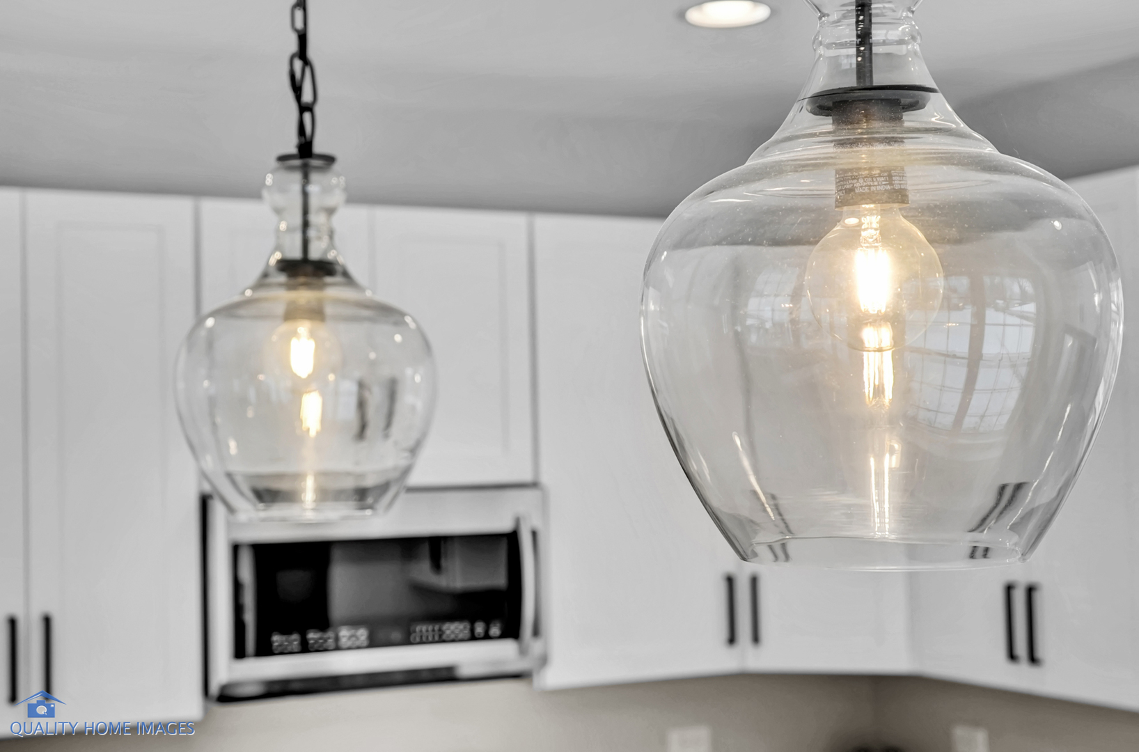 215 North Summit Street Wheaton, IL 60187 - Photo 31 of 36 a living room with a fireplace and a chandelier