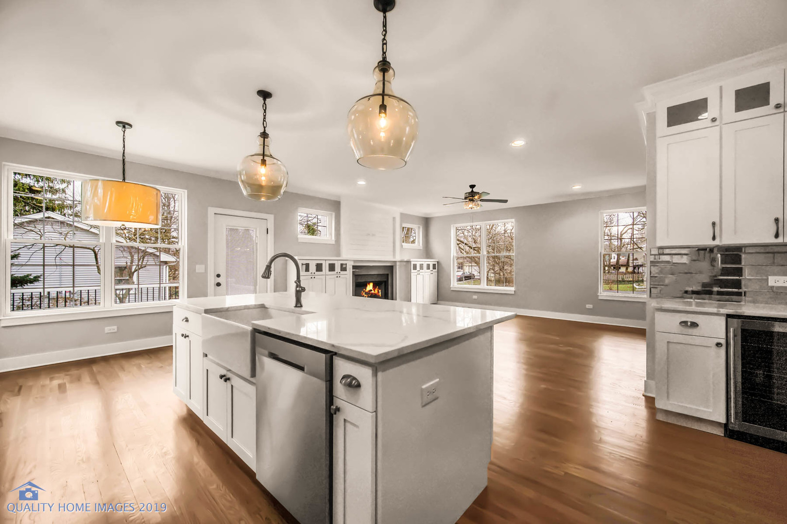 215 North Summit Street Wheaton, IL 60187 - Photo 4 of 36 a kitchen with stainless steel appliances granite countertop a sink a stove and a wooden floor