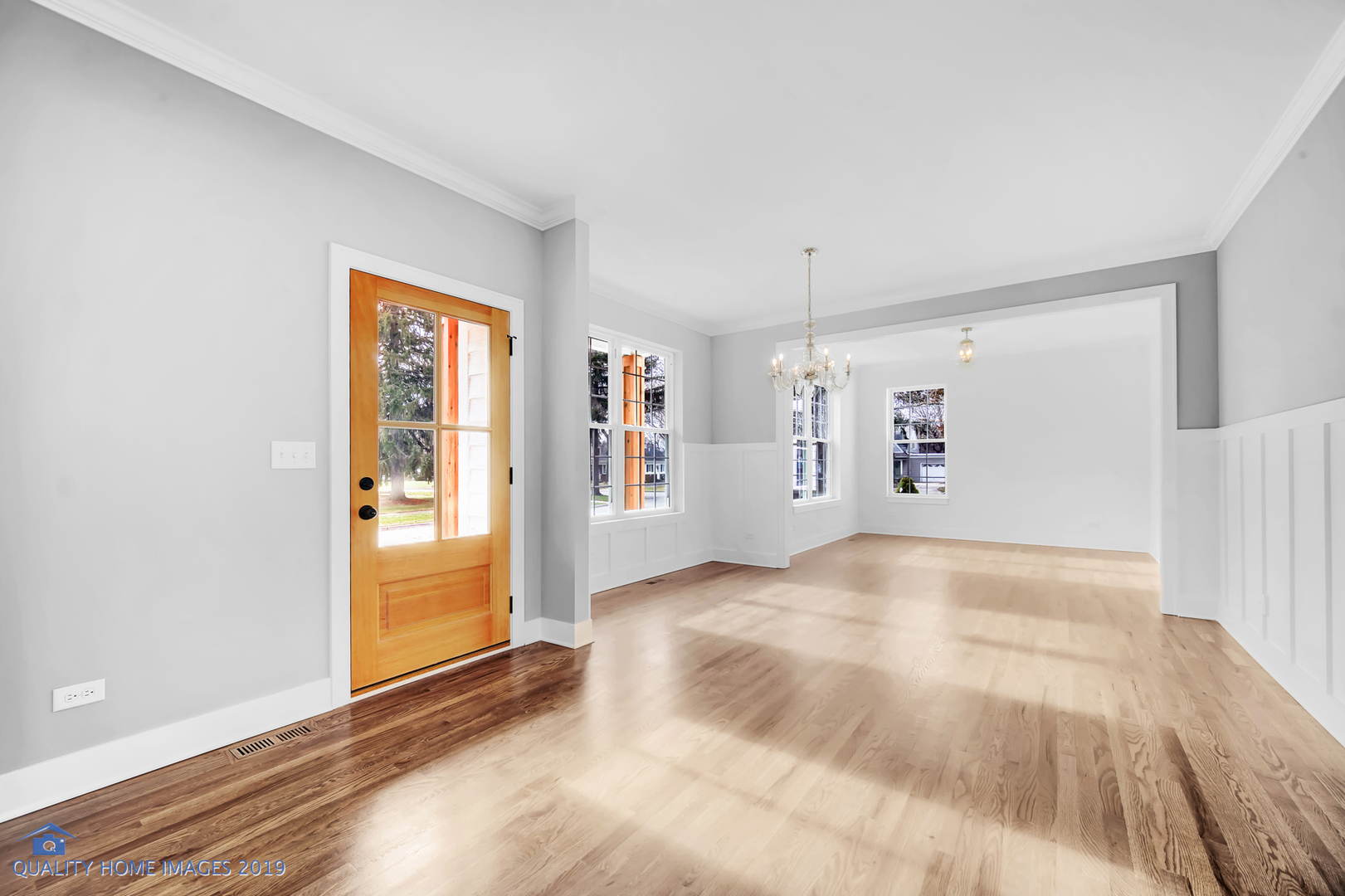 215 North Summit Street Wheaton, IL 60187 - Photo 6 of 36 a view of a livingroom with an empty space and a window