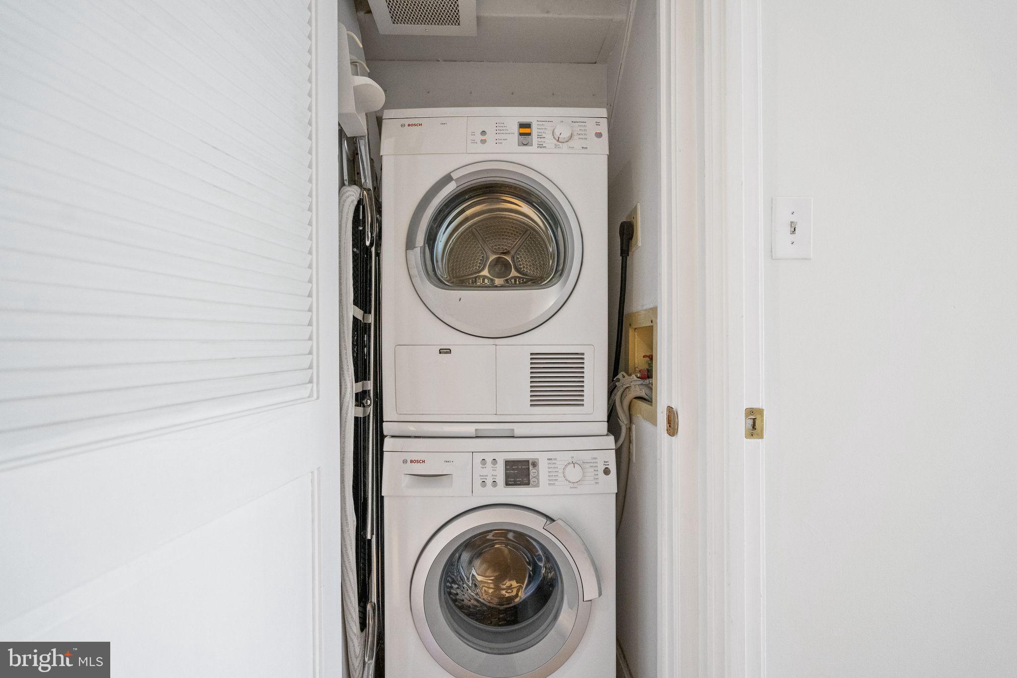 3225 Grace Street Northwest, Unit 226 Washington, DC 20007 - Photo 36 of 45 a utility room with dryer and washer