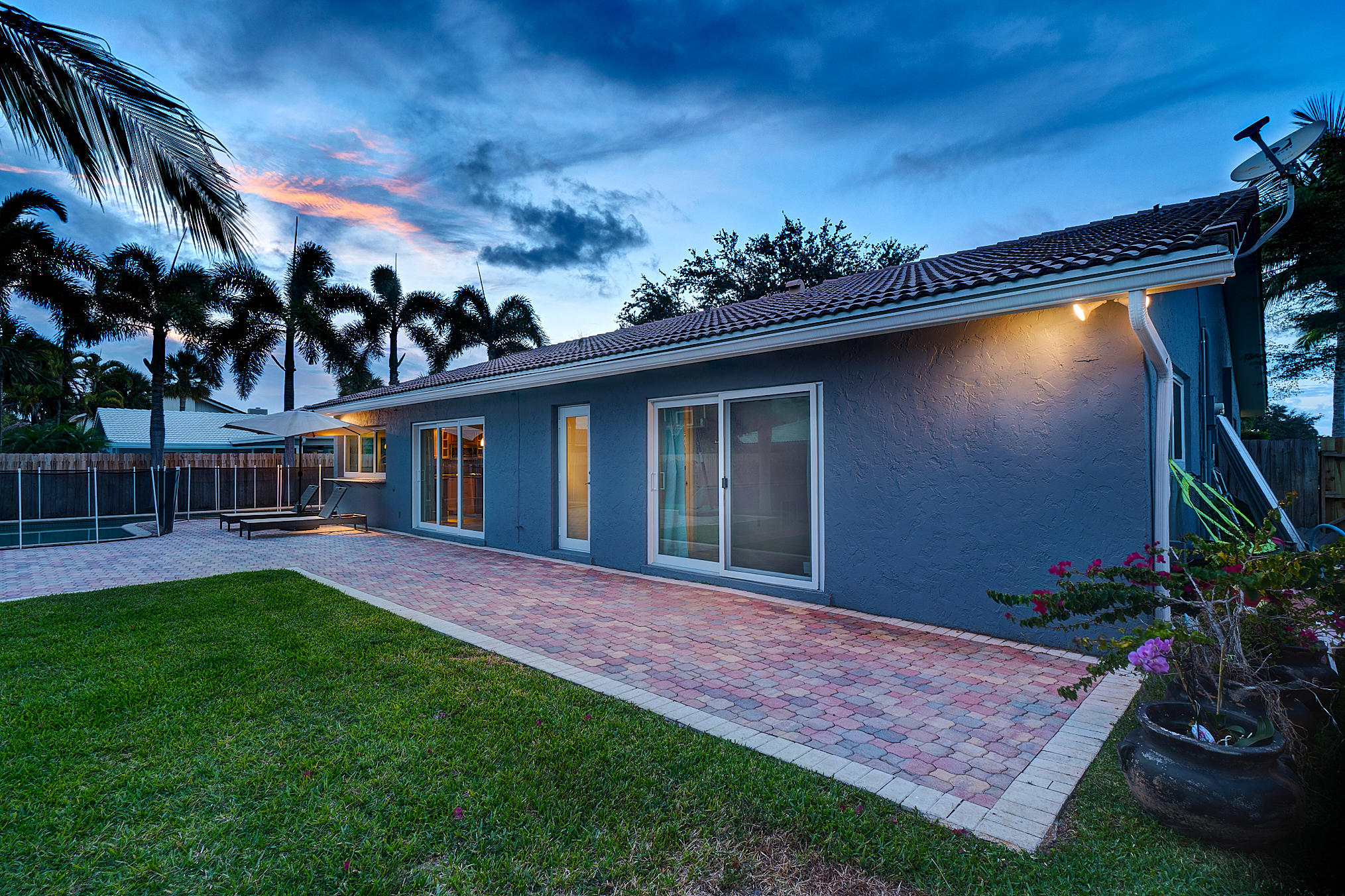 1424 Southwest 13th Street Boca Raton, FL 33486 - Photo 27 of 35 Rear View/Impact Doors
