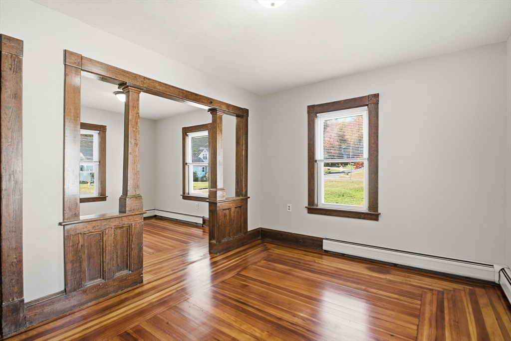 114 Connecticut Avenue West Springfield, MA 01089 - Photo 11 of 30 wooden floor in an empty room with a window