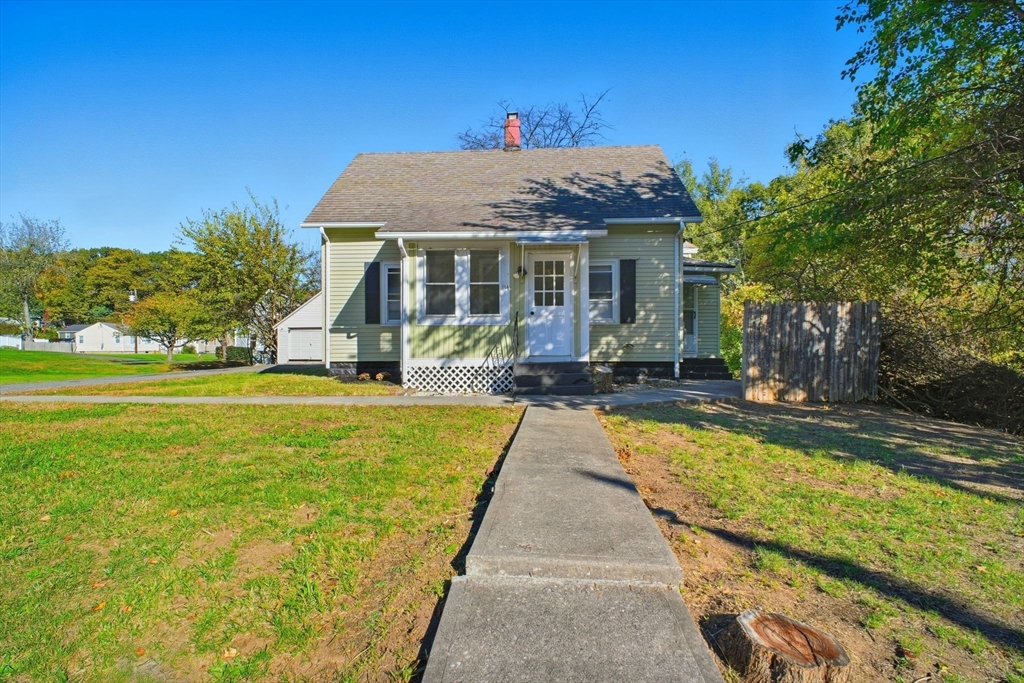 114 Connecticut Avenue West Springfield, MA 01089 - Photo 2 of 30 a view of a house with swimming pool and sitting area
