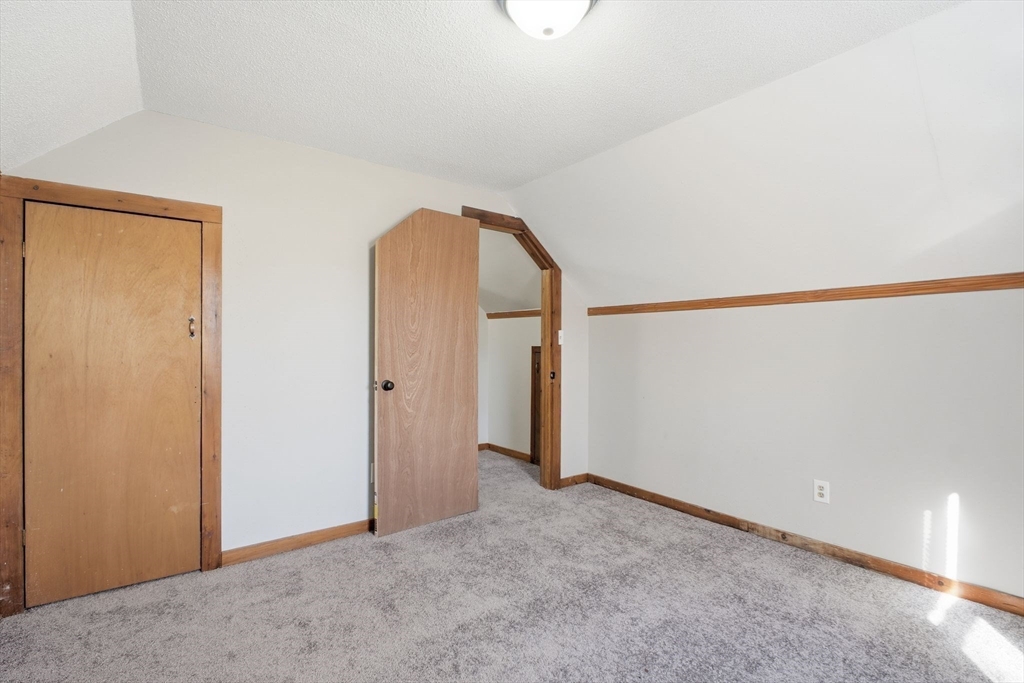 114 Connecticut Avenue West Springfield, MA 01089 - Photo 21 of 30 a view of an empty room with wooden floor