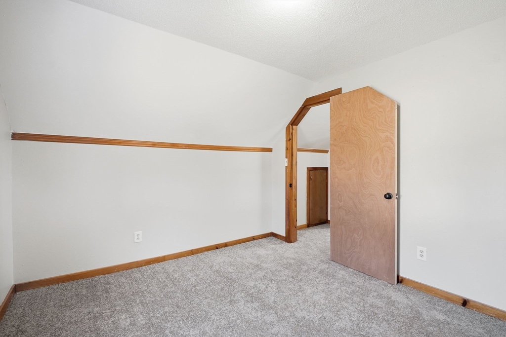 114 Connecticut Avenue West Springfield, MA 01089 - Photo 23 of 30 a view of a room with drop ceiling fan and hallway