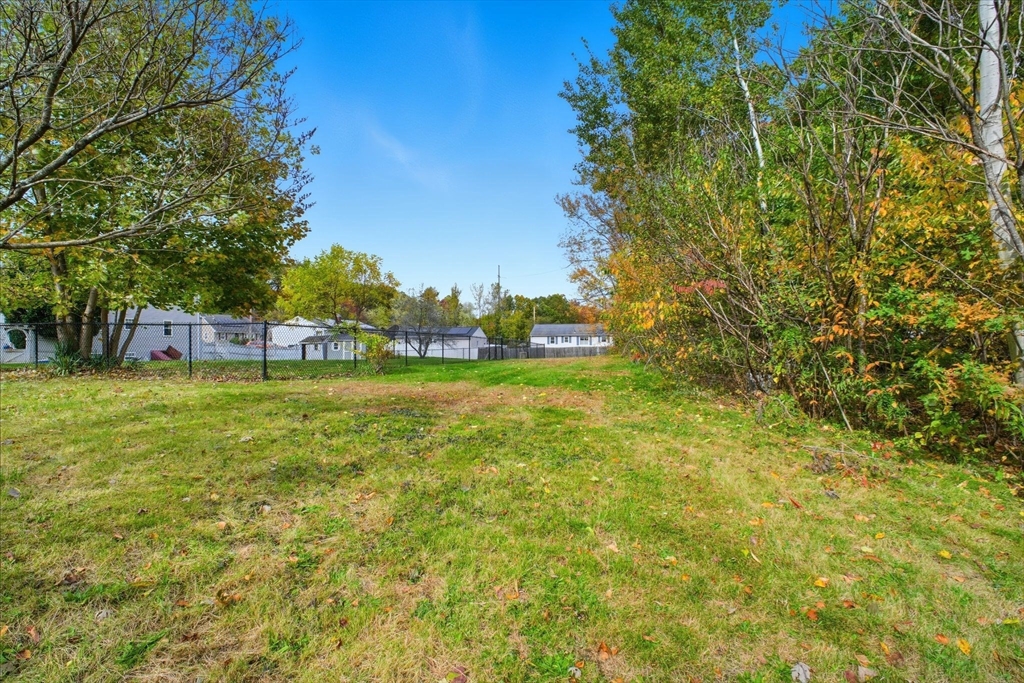 114 Connecticut Avenue West Springfield, MA 01089 - Photo 27 of 30 a view of a garden with a building