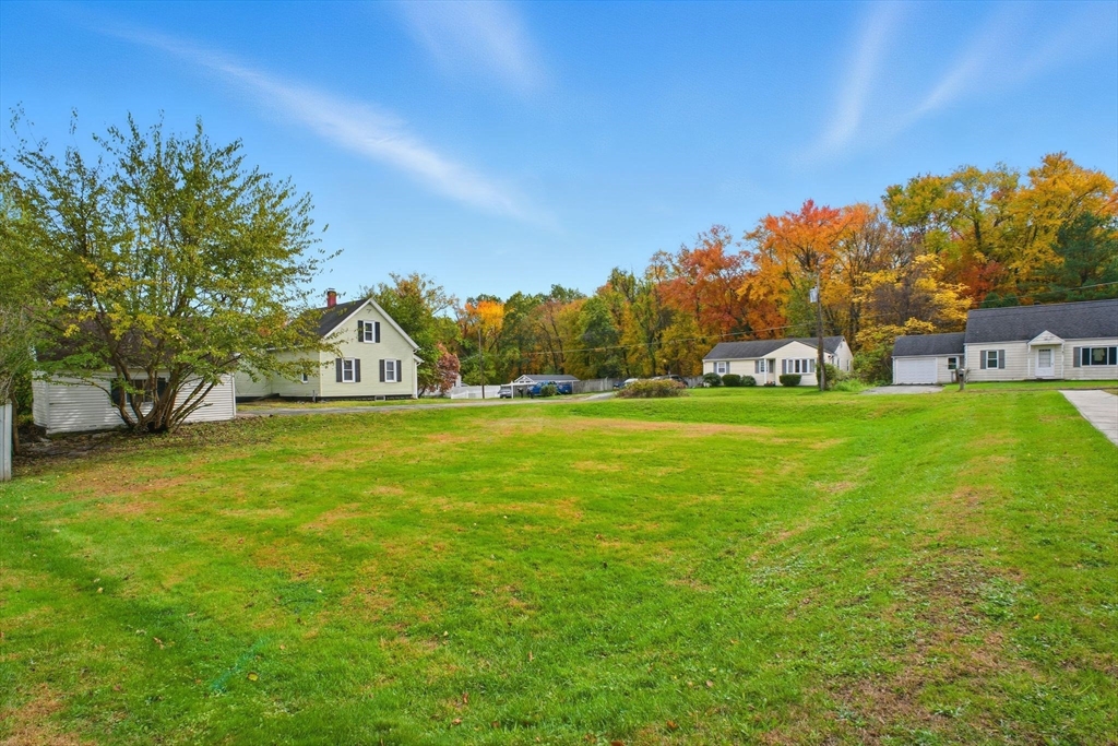 114 Connecticut Avenue West Springfield, MA 01089 - Photo 29 of 30 a view of green field with tree in the background