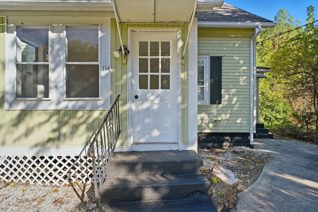 114 Connecticut Avenue West Springfield, MA 01089 - Photo 5 of 30 a front view of a house with a yard
