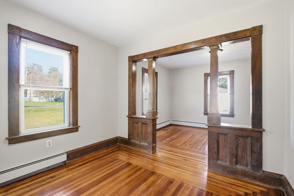 114 Connecticut Avenue West Springfield, MA 01089 - Photo 8 of 30 a view of empty room with wooden floor and fan