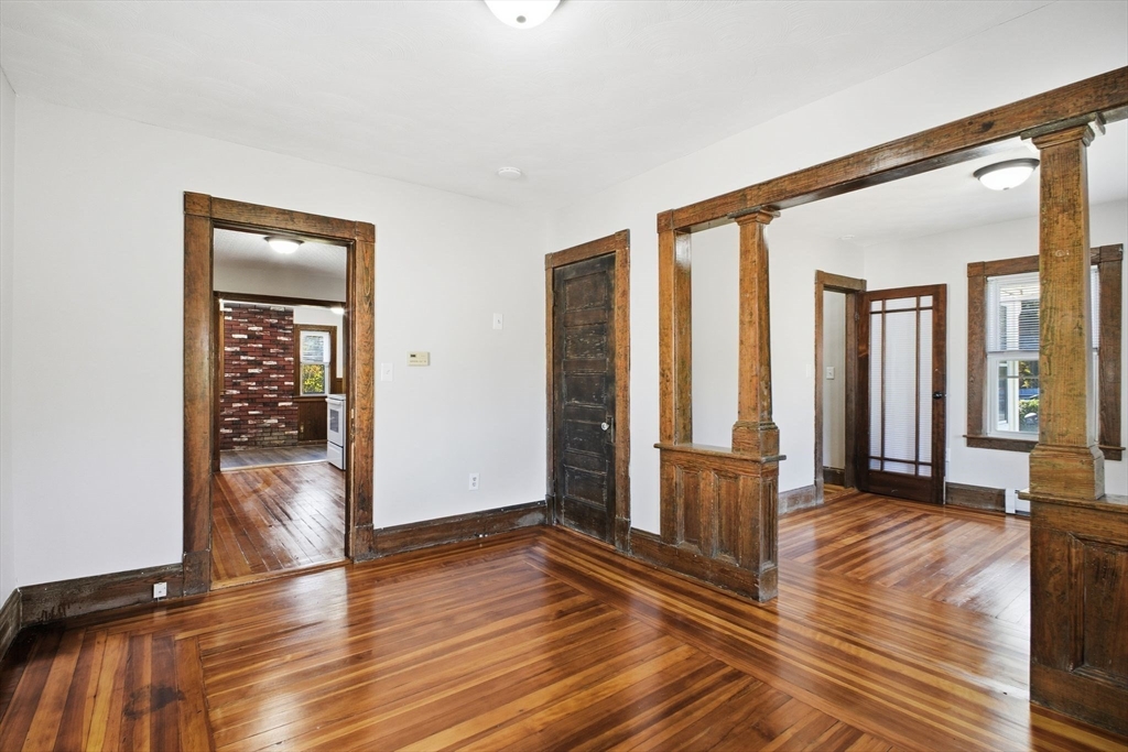 114 Connecticut Avenue West Springfield, MA 01089 - Photo 10 of 30 a view of hallway with wooden floor and stairs