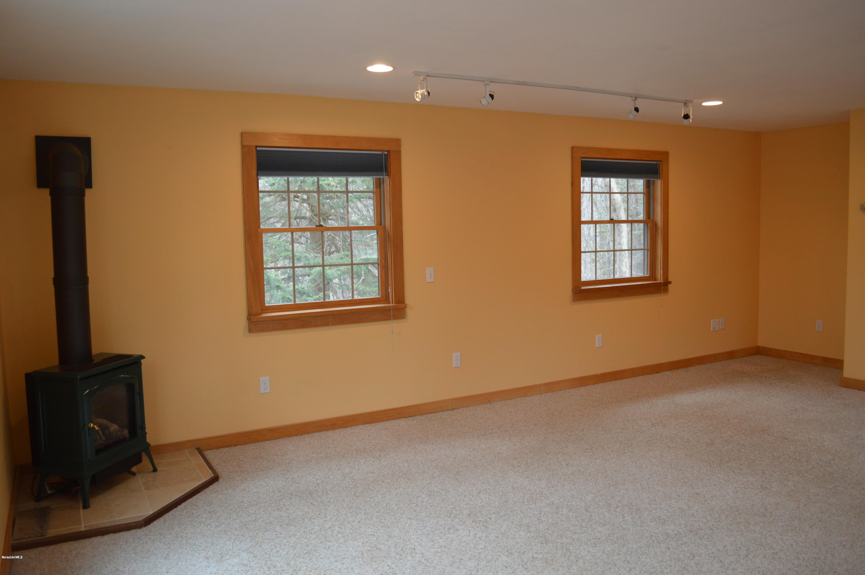 98 Wade Inn Road Becket, MA 01223 - Photo 7 of 30 a view of an empty room with a window