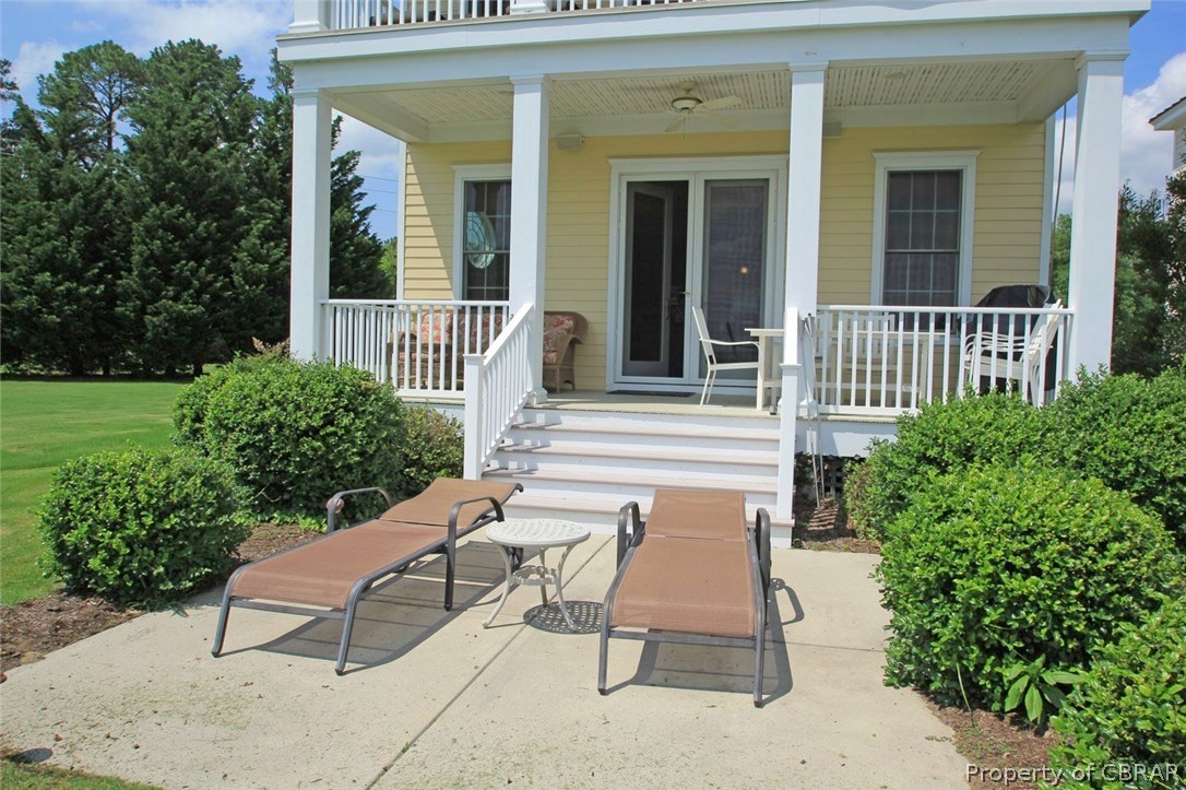 35 West High Bank Road White Stone, VA 22578 - Photo 8 of 37 Covered Porch downstairs & covered porch upstairs off the Master Bedroom with a hot tub