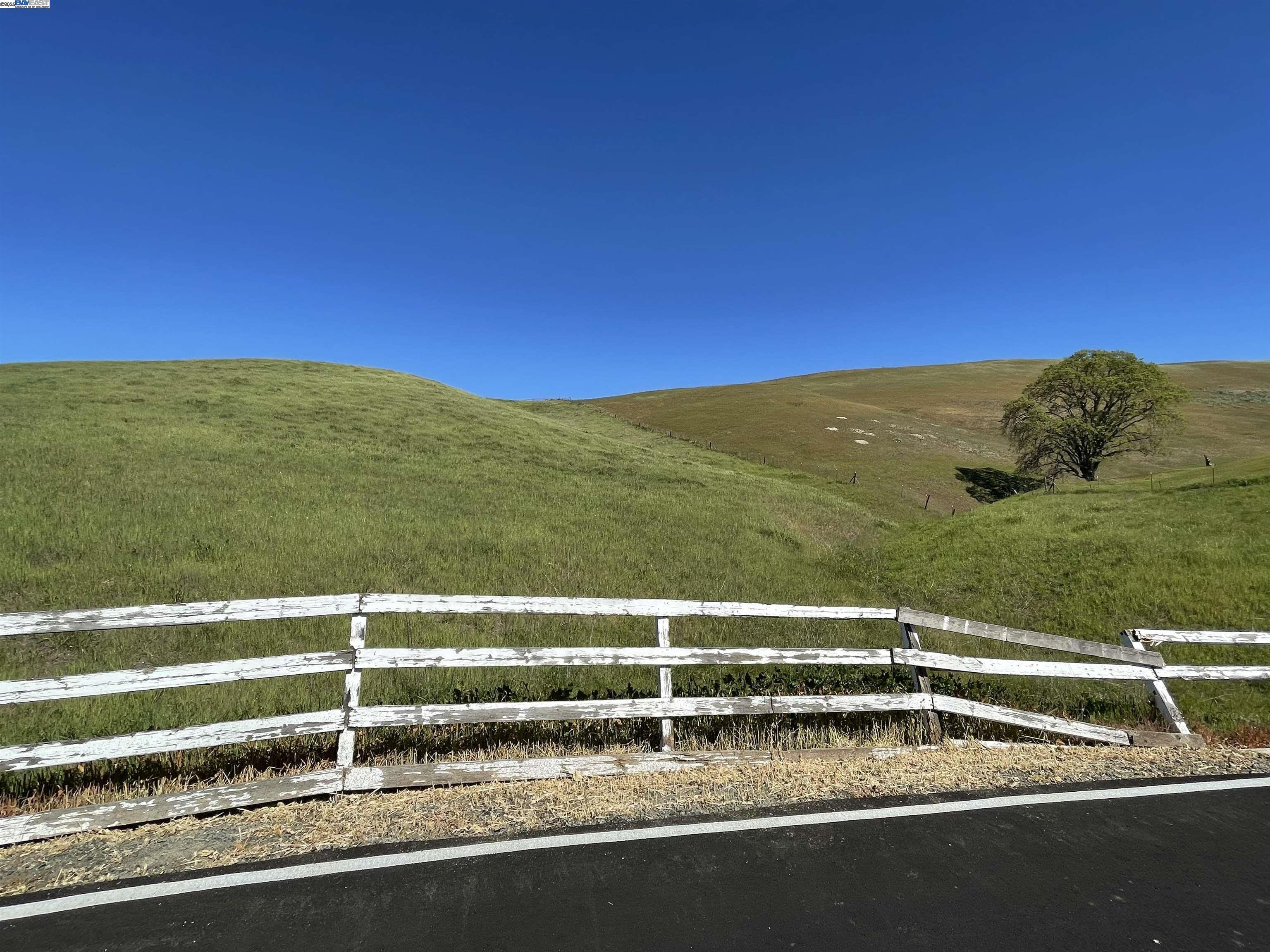 3343 Little Valley Road Sunol, CA 94586 - Photo 17 of 19 a view of a swimming pool with a yard