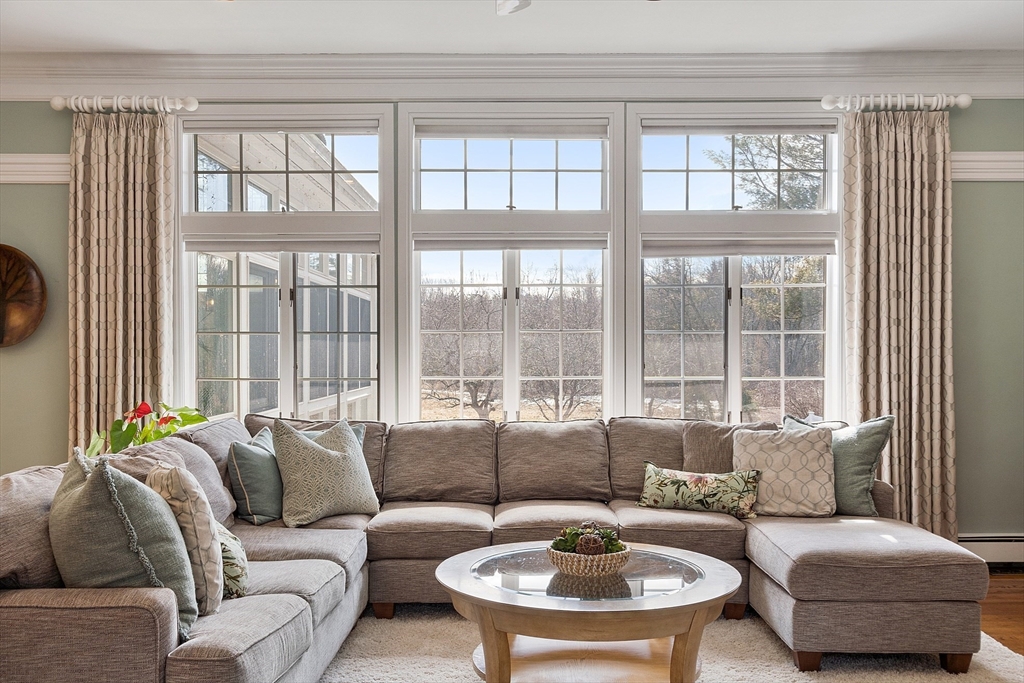 336 Lexington Road Concord, MA 01742 - Photo 11 of 41 a living room with furniture and a large window