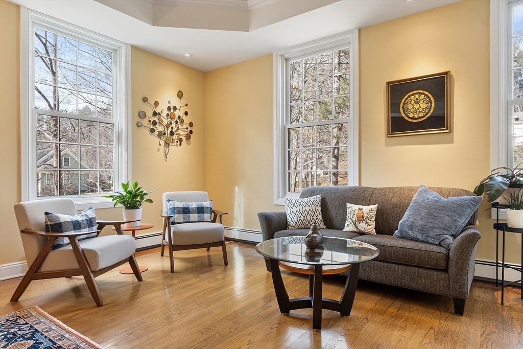 336 Lexington Road Concord, MA 01742 - Photo 16 of 41 a living room with furniture and a window