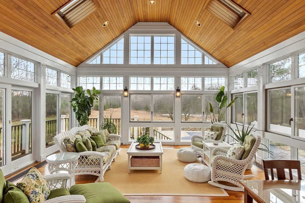 336 Lexington Road Concord, MA 01742 - Photo 18 of 41 a living room with furniture and a large window