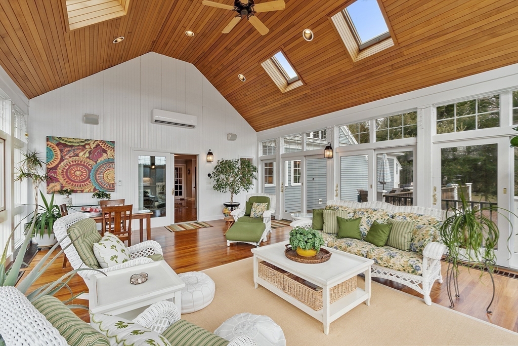 336 Lexington Road Concord, MA 01742 - Photo 19 of 41 a view of a patio with couches chairs and potted plants