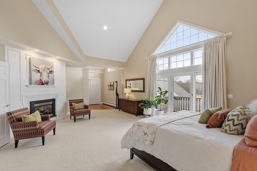 336 Lexington Road Concord, MA 01742 - Photo 25 of 41 a bedroom with a bed and a couch