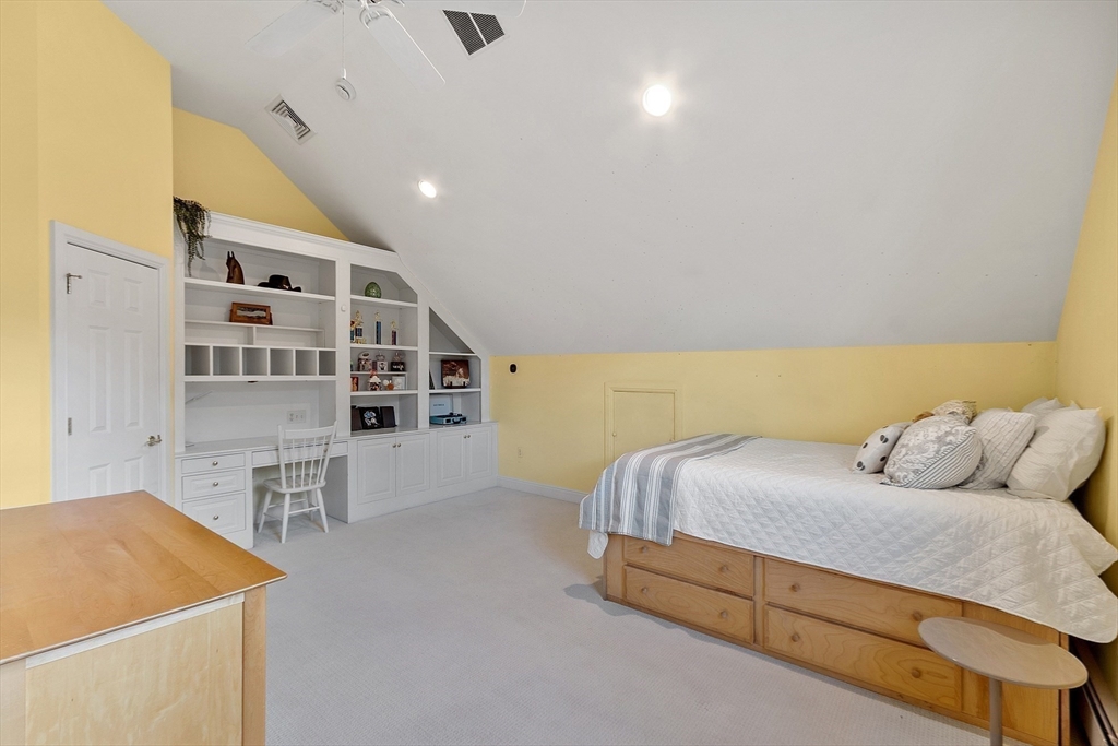 336 Lexington Road Concord, MA 01742 - Photo 34 of 41 a bedroom with a bed and furniture