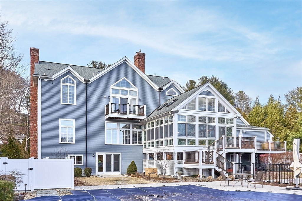 336 Lexington Road Concord, MA 01742 - Photo 4 of 41 a front view of a building with lot of windows