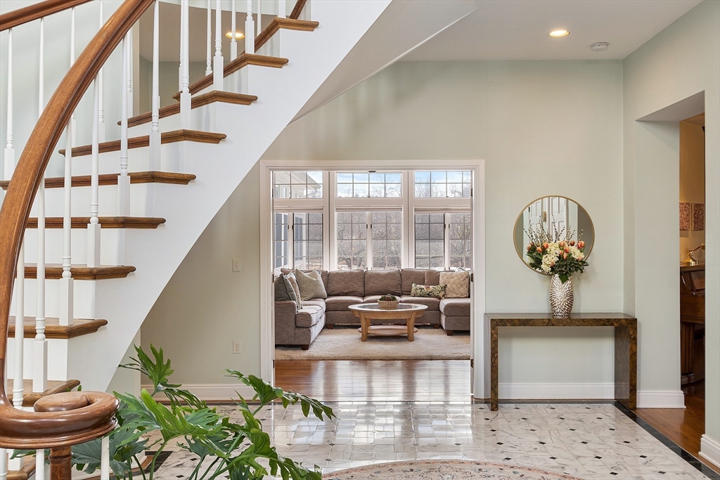 336 Lexington Road Concord, MA 01742 - Photo 8 of 41 a view of entryway with wooden floor